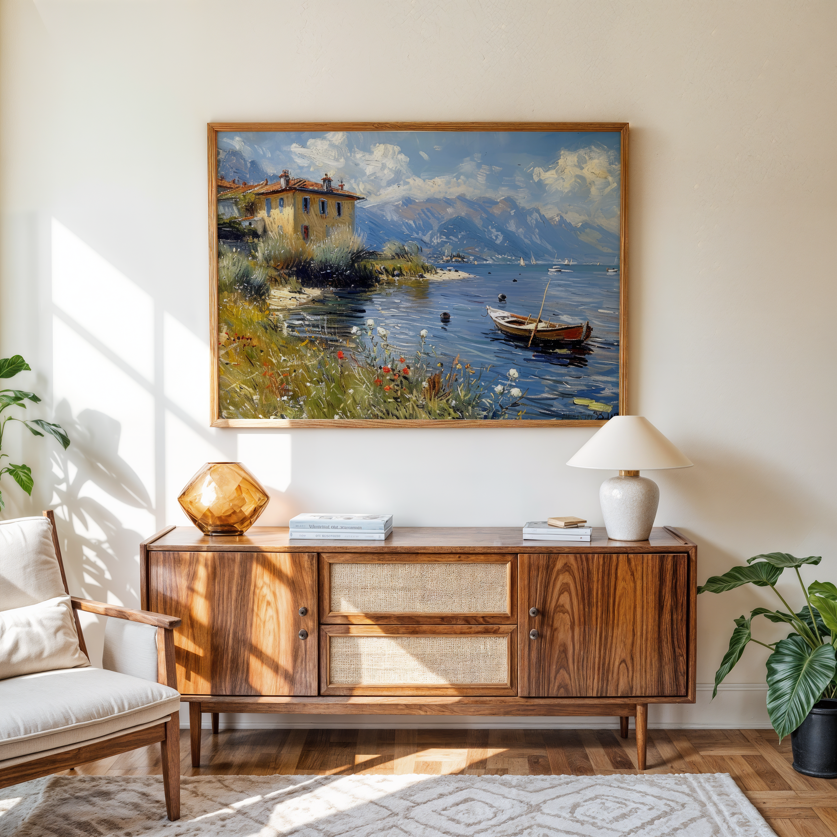 Living room with wooden sideboard, lamp, and painting of a lake scene.