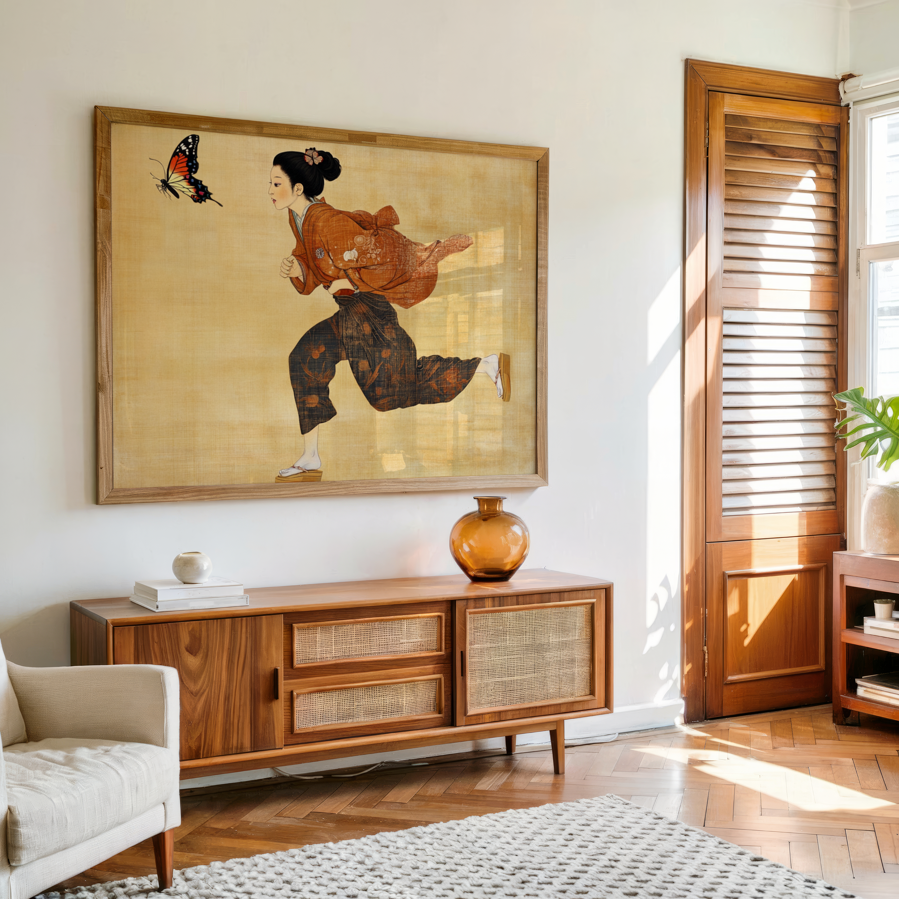 Living room with wooden sideboard, artwork of a woman, and a butterfly.