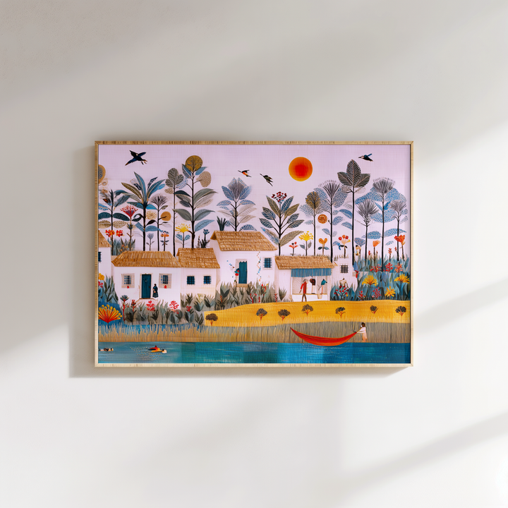 Framed artwork of a colorful landscape with houses, trees, and a boat on a white wall.